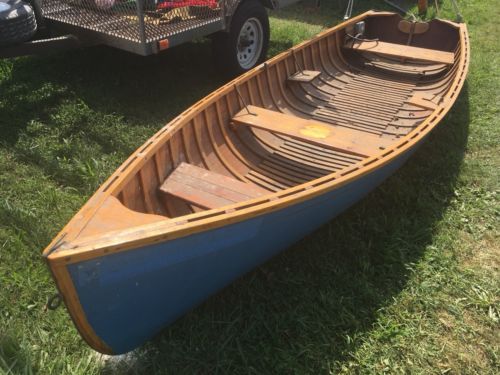 (c) 1950’s Thompson Square end pulling Fishing Out Board boat rowing row