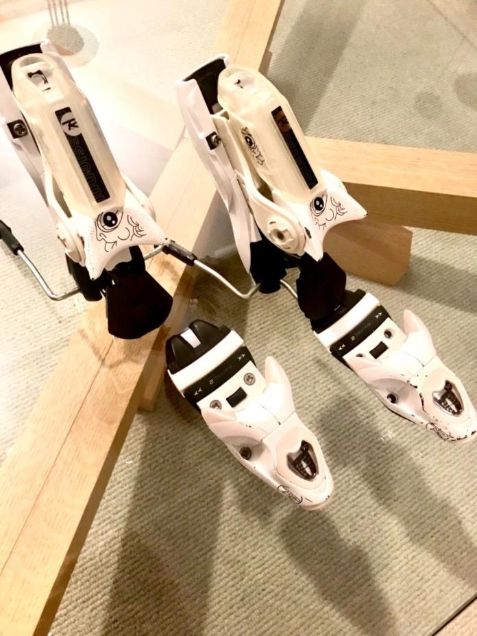 Rossignol ski bindings. White, with black graphic, DIN up to 10. Woman’s binding
