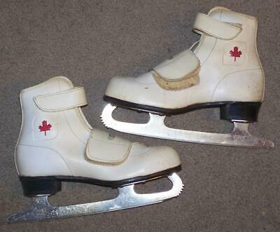 WHITE LEATHER SLM CANADA CHILD'S SIZE 8 1/3 FIGURE SKATES, WITH MAPLE LEAF