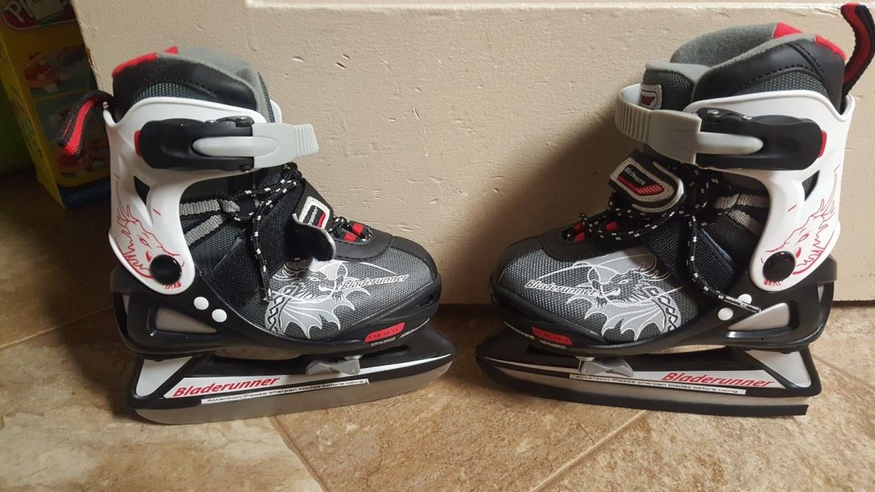 Boys ice skates (bladerunner) 4 adjustable sizes 11-1. Black, white, red