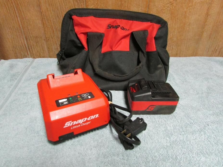 snap on tools 18 volt charger , battery , and storage bag fm-9