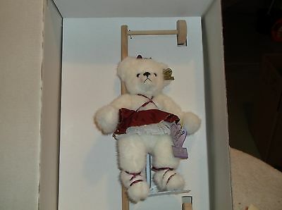 A Collectible Bear CO. that is 7 inches tall