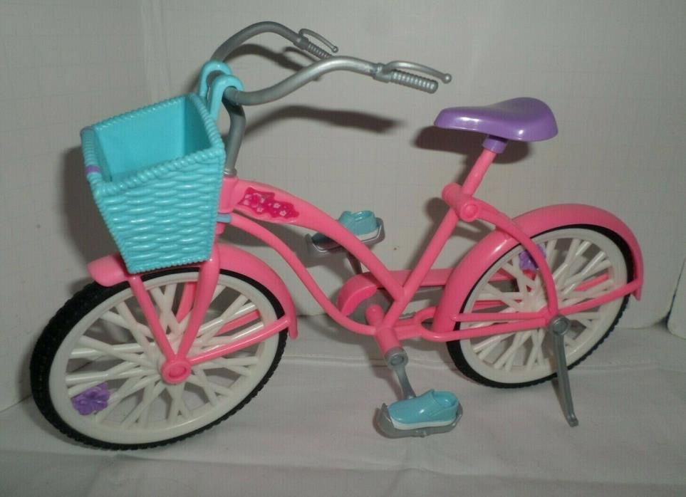 Barbie Pink Bicycle With Blue Basket Purple Seat And Tennis Shoes On the Pedals
