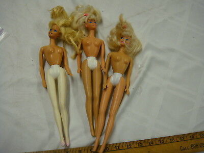3 vintage 1966 Mattel white molded bottom Barbie dolls as seen