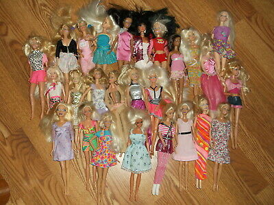 1999 Barbie dolls, 12 inch, lot of 26  ..all dressed, NO SHOES