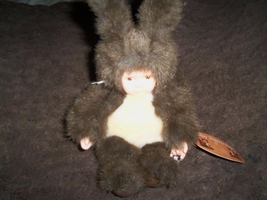 Brown Squirrel Anne Geddes     Yellow doll with wings  -- no name of company