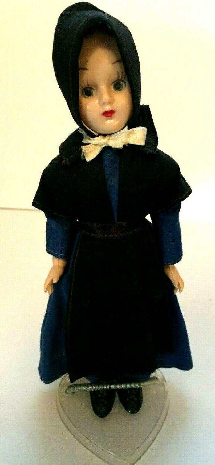 Amish Girl Doll in Black Cape with Blue Dress 7 inches Blinking Eyes w/ Stand