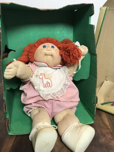 vintage Cabbage Patch Kid with damaged box --1985 red hair w/piggy tails