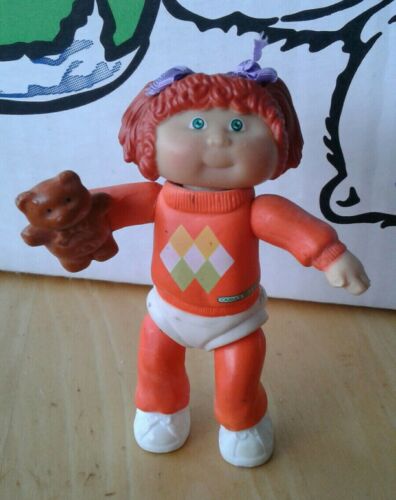 Vintage 1984 Cabbage Patch Girl figure in Orange outfit w/ Teddy Bear