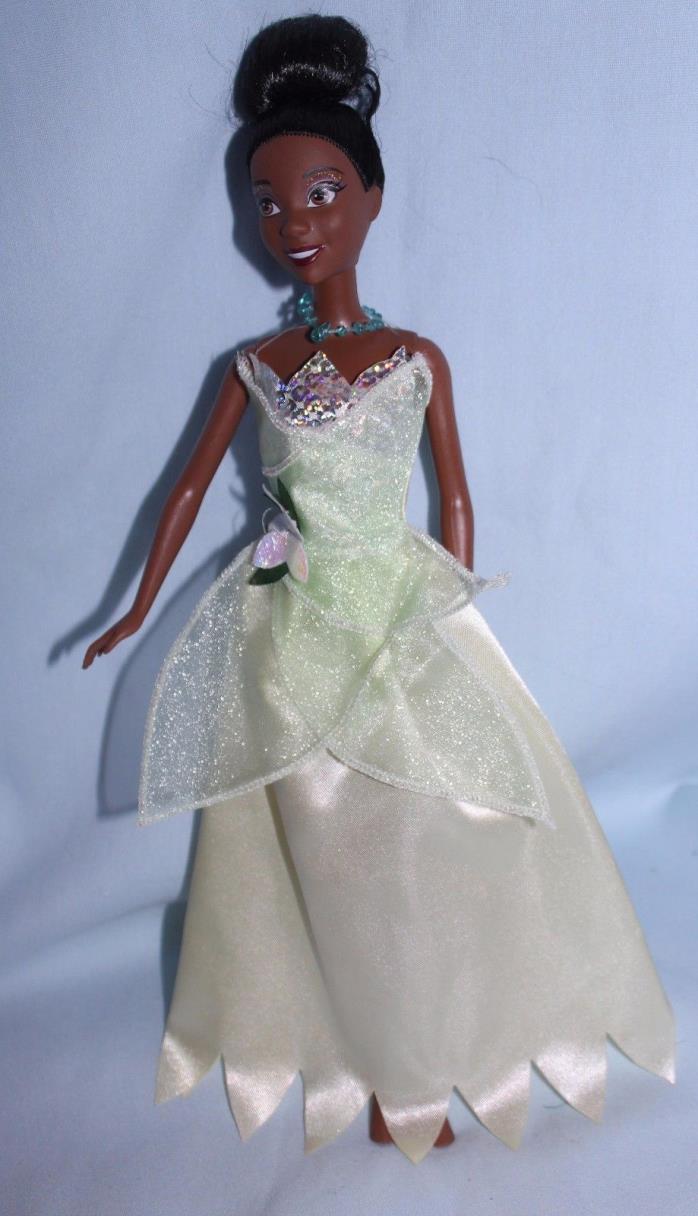Tiana doll Princess and the Frog bun hair yellow petal gown Disney
