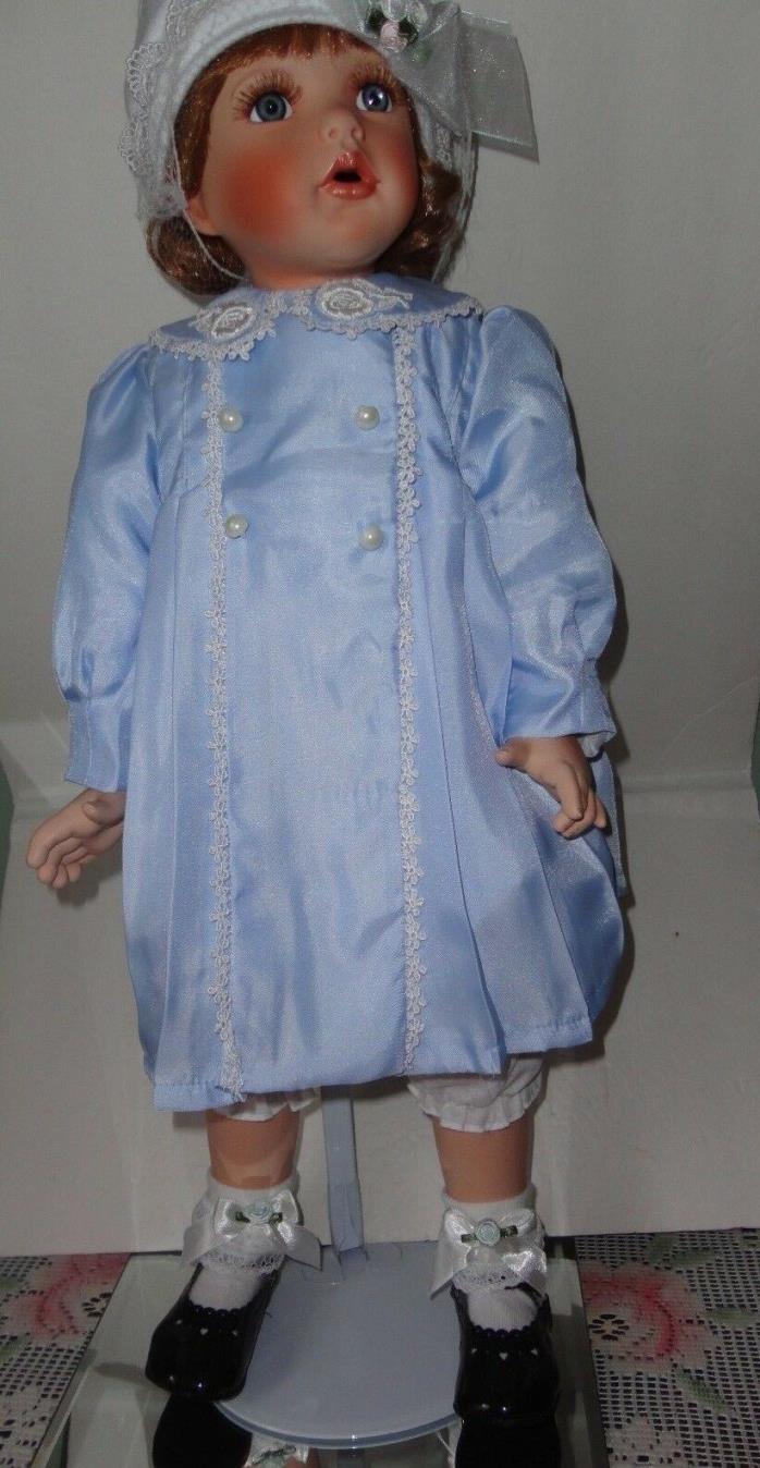 Paradise Galleries  25'' Porcelain Doll Dressed in Blue