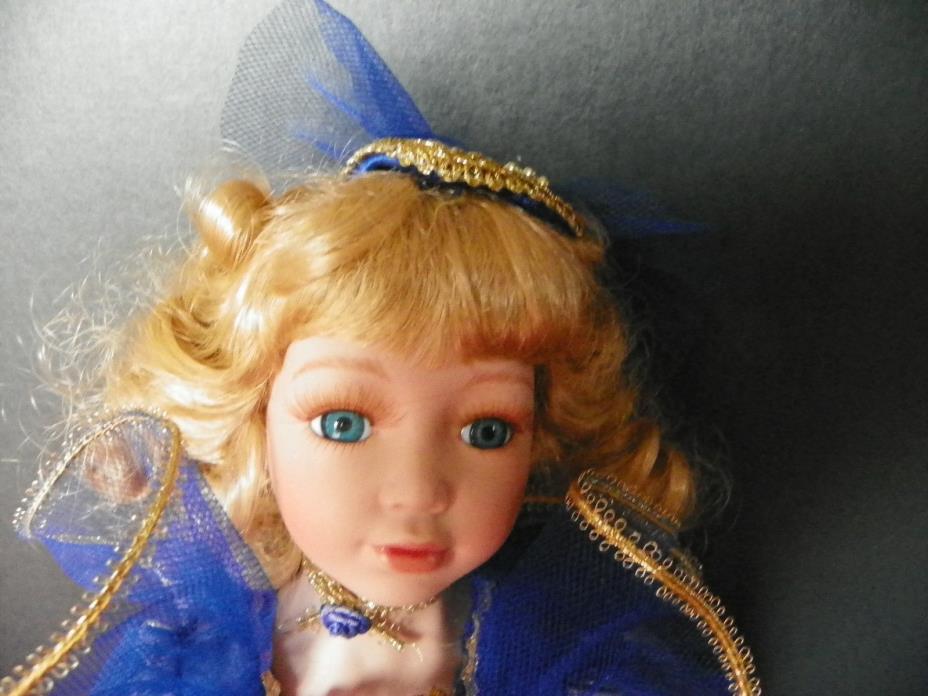 Beautiful princess doll in blue with tool 17 inches tall