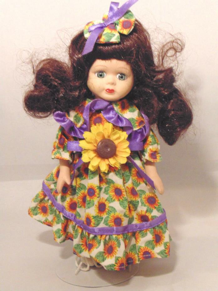Kaiser Porcelain Doll Sunflower Floral Dress and Metal Stand 8 inch Collectible