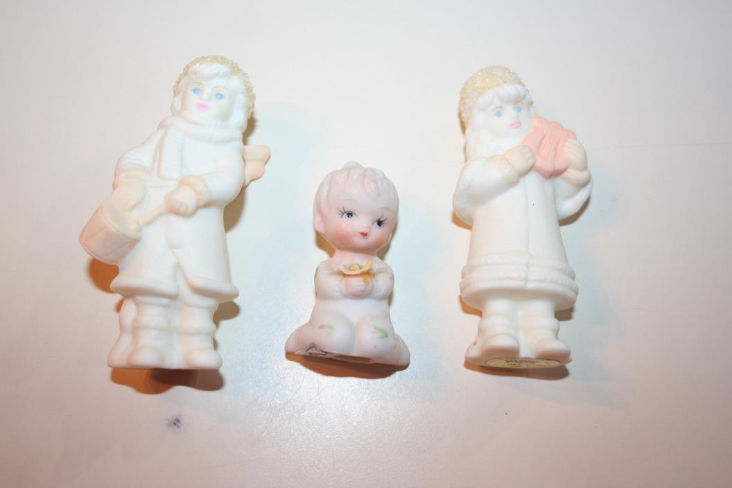 2 Russ Figurines