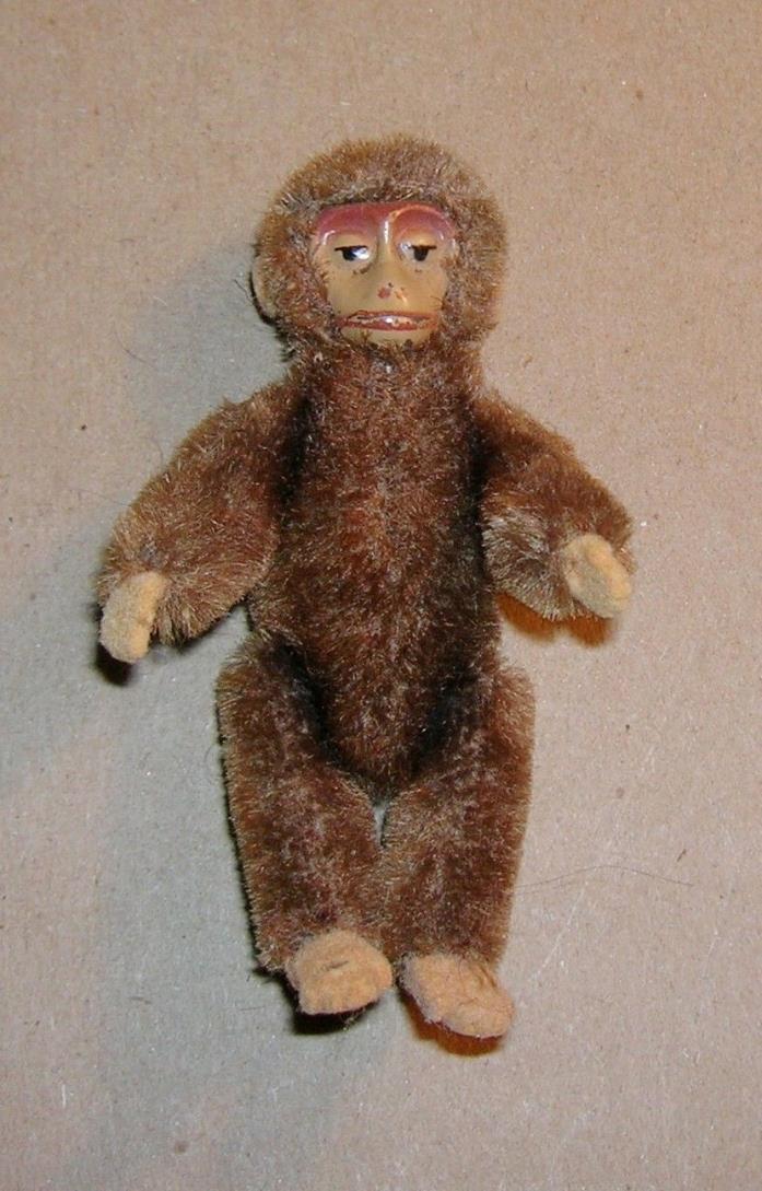 ANTIQUE SCHUCO TINY ARTICULATED PAINTED FACE PLUSH MONKEY