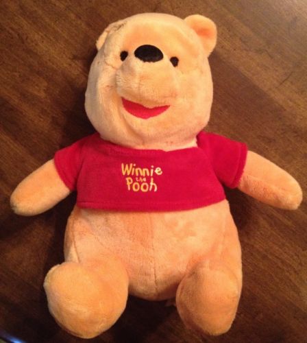 Disney Winnie The Pooh Plush stuffed animal 11 inches tall sitting teddy bear