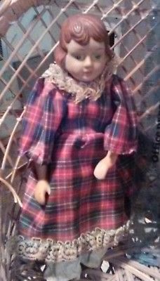 BISQUE OR OTHER SUCH MATERIAL TYPE DOLL WITH MOLDED HAIR