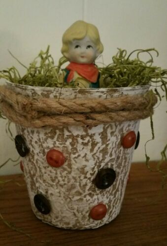 VINTAGE CERAMIC BISQUE FROZEN CHARLOTTE DOLL ~COWGIRL FIGURINE IN NEST BASKET