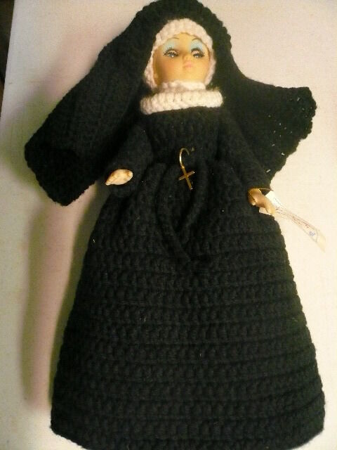 VINYL  DOLL  DRESSED  AS  A  NUN.. KINITTED OUTFIT..SLEEPY EYE