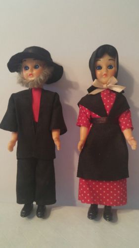 Vintage plastic Amish Dolls with moving eyesand elastic attached head and arms