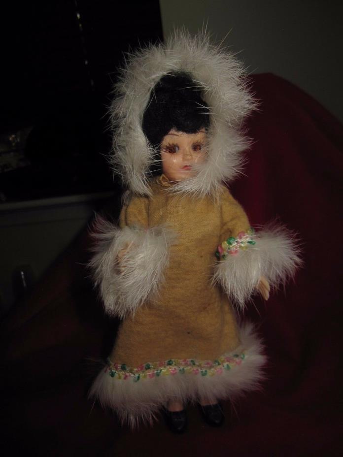 VINTAGE HARD PLASTIC ESKIMO DOLL WITH MATERIAL FUR TIMMED COAT