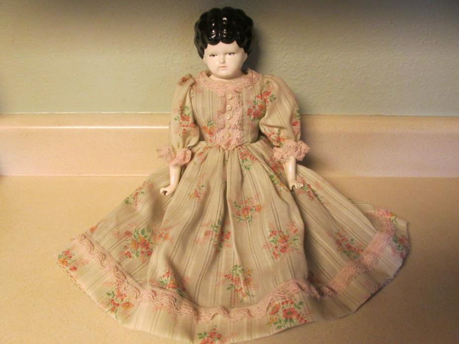 REPRODUCTION VINTAGE CERAMIC PORCELAIN? DOLL WITH CLOTH BODY!
