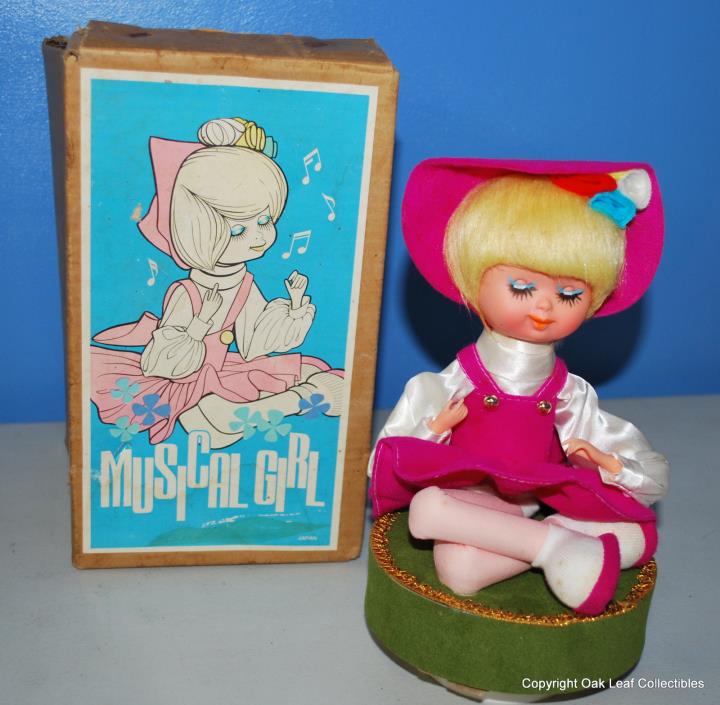 Musical Doll in Box. Japan  NEW unplayed with.1960's 9 inches tall. CUTE!