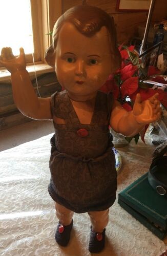 # 51 Celluloid Doll With Original Clothes & Glass Button,Made In Czechoslovakia