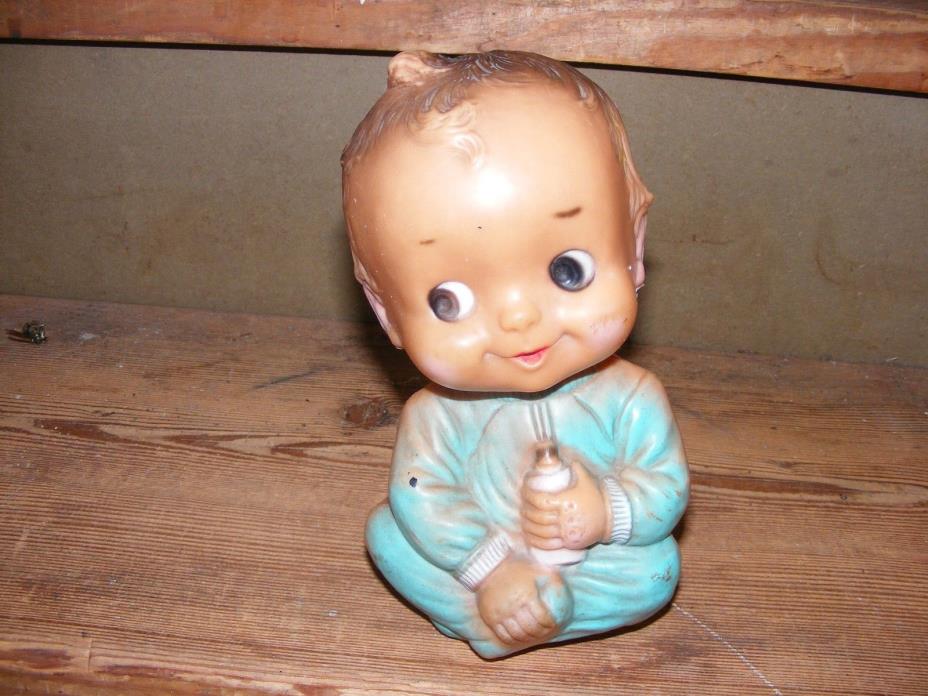 Vintage rubber baby doll happy  holding bottle squeak