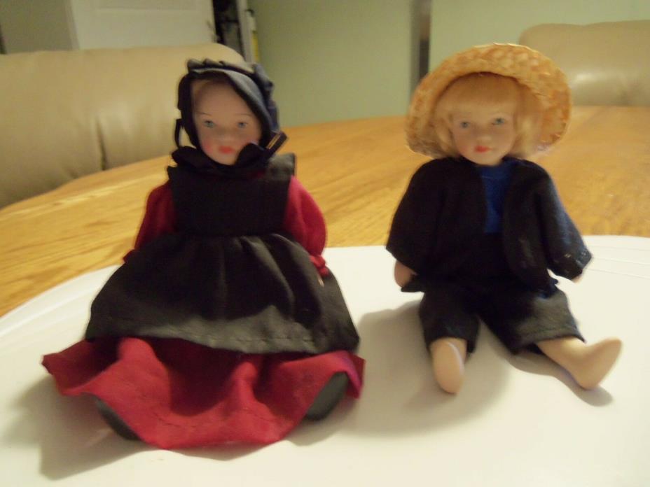 7 1/4 inch Amish Porcelain boy and  girl dolls