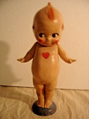 Antique Composition Kewpie Doll with Wings, Top Knot and Googly Eyes. 8833