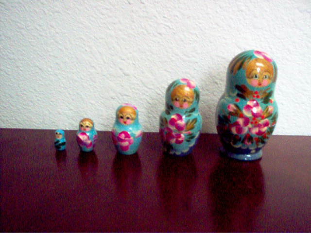 Girl With Flowers Nesting Dolls  5 Dolls in All