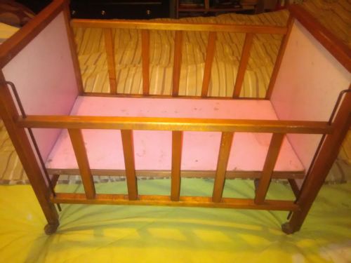 1950s doll bed with castor's