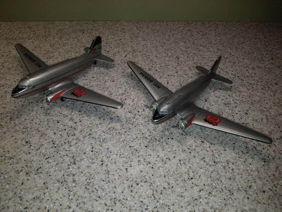 2 VINTAGE PHILLIPS PETROLEUM DC-3  DIECAST AIRPLANE COIN BANKS