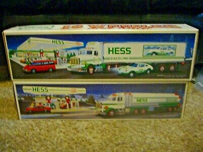 LOT OF 2 HESS COLLECTOR TOY TRUCKS TANKER AND 18 WHEELER WITH RACER NEW IN BOXES