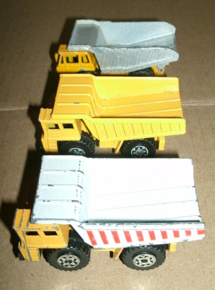 Three Large Dump Truck Diecast Earth Movers 1/140 Matchbox 1/100 Majorette Benne