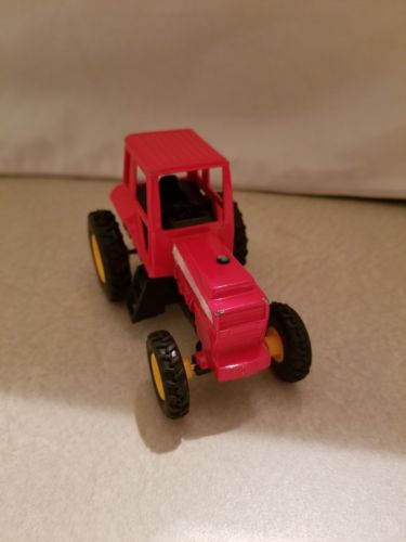 SMALL RED PULL AND LET GO RED CAB OVER  TRACTOR TOY 4