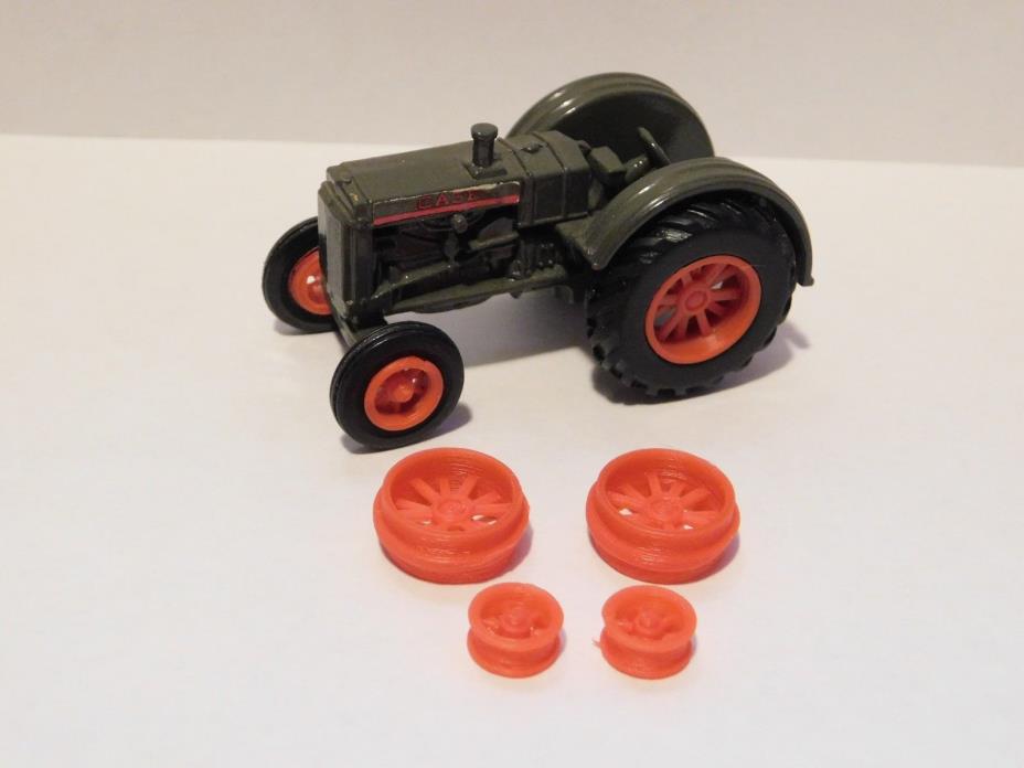 Custom 3D printed spoked rims for 1/64 Case Model L Tractors.