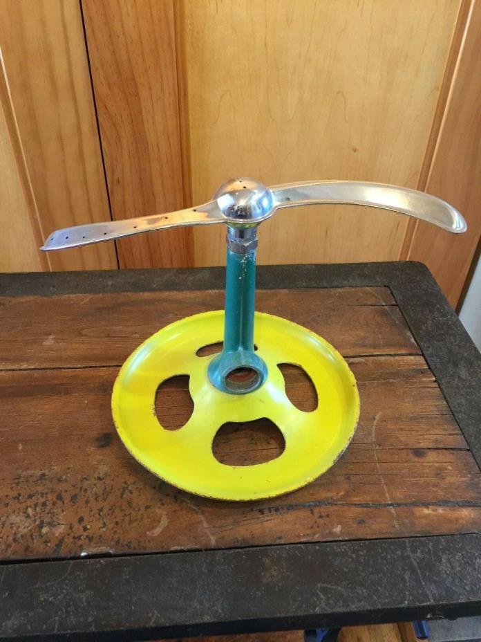 Green and Yellow Art Deco Sprinkler
