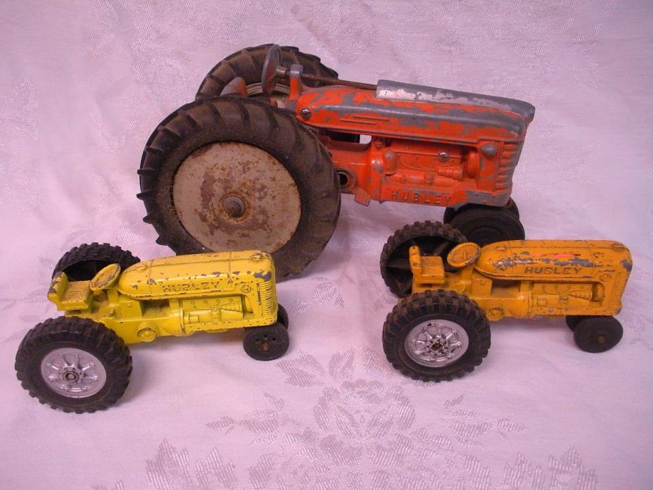 lot of 3 1950s HUBLEY RED YELLOW ORANGE DIECAST FARM TRACTORS  Kiddie Toy