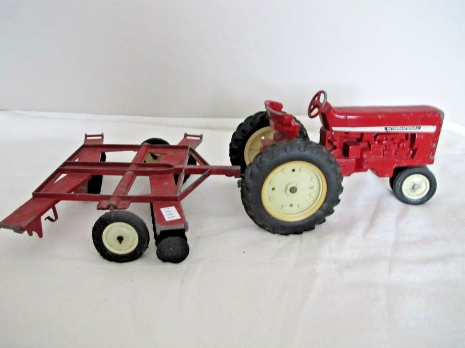 Antique Metal Tractor and Disk Harrow Toy