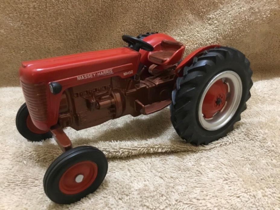 Custom Cast Massey Harris MH50 copper bottom toy tractor. 1/16 scale Sharp