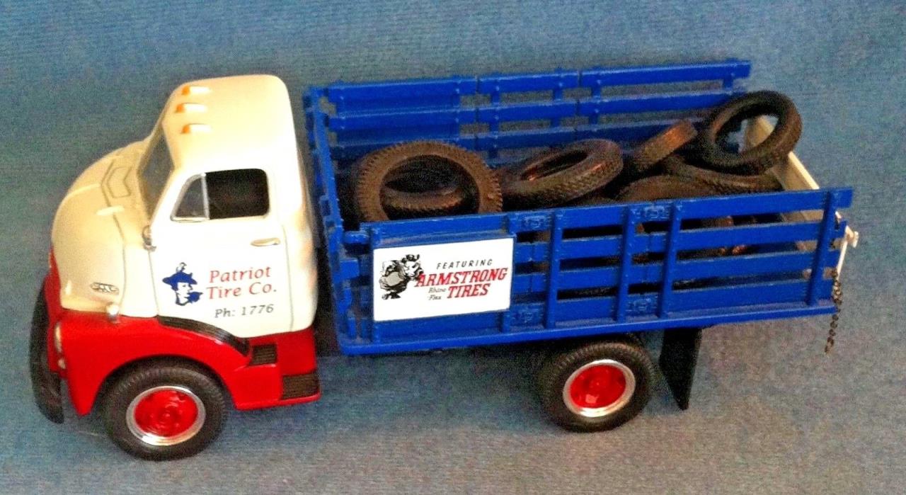 PATRIOT TIRE CO. 1952 GMC STAKE TRUCK WITH 12 TIRES LOAD FIRST GEAR 1:34