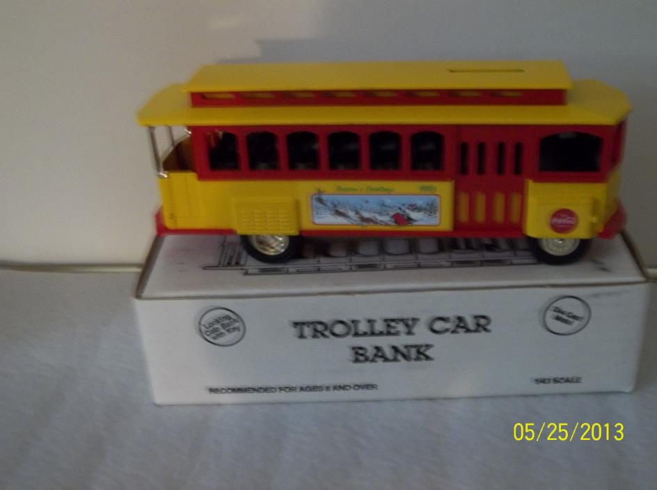 ERTL TROLLEY CAR BANK COCA COLA SEASONS GREETINGS 1993. 1/43 SCALE. New in box.