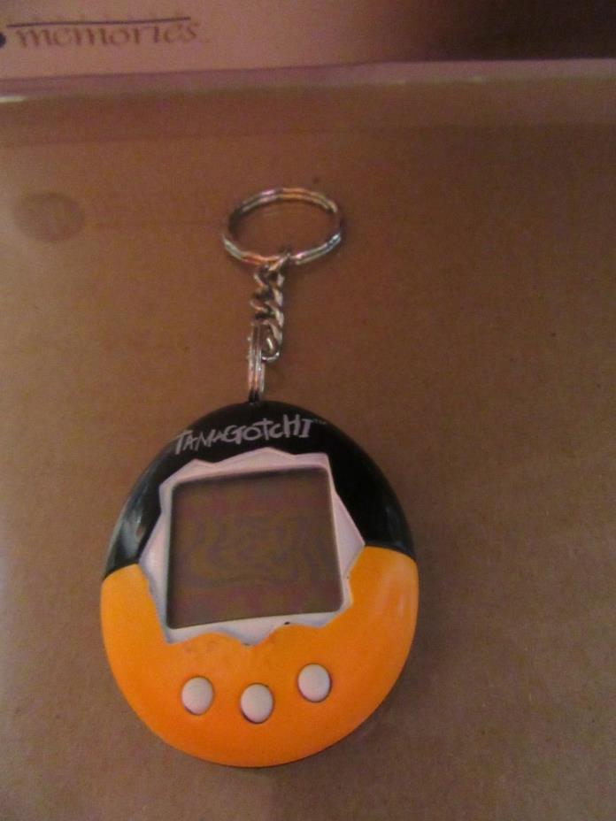 Original Tamagotchi 1997 (Black & Orange)  Key Chain untested
