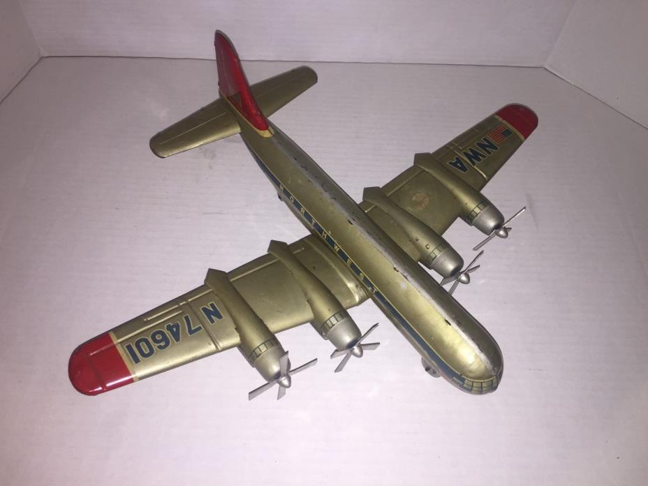 NORTHWEST AIRLINES BOEING STRATOCRUISER TIN FRICTION TOY ALPS JAPAN