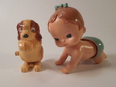 Vintage Pair of 1977 TOMY Taiwan Wind Up Toys Baby Crawling and Hopping Dog