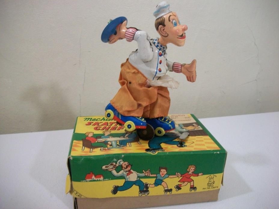 Vintage T.P.S. Windup Skating Chef With Original Box
