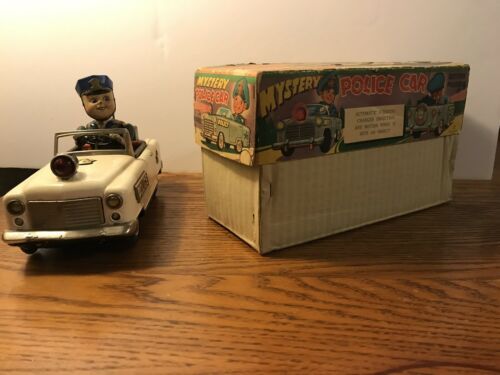 Vintage Mystery police car Japan Tinplate Battery Powered.