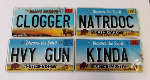 4 NORTH DAKOTA vanity LICENSE PLATES